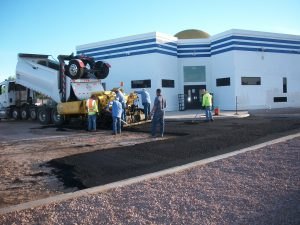 The paving crew at work by the entrance